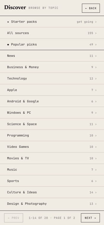 The Discover screen on a phone listing topic categories and starter packs of curated sources